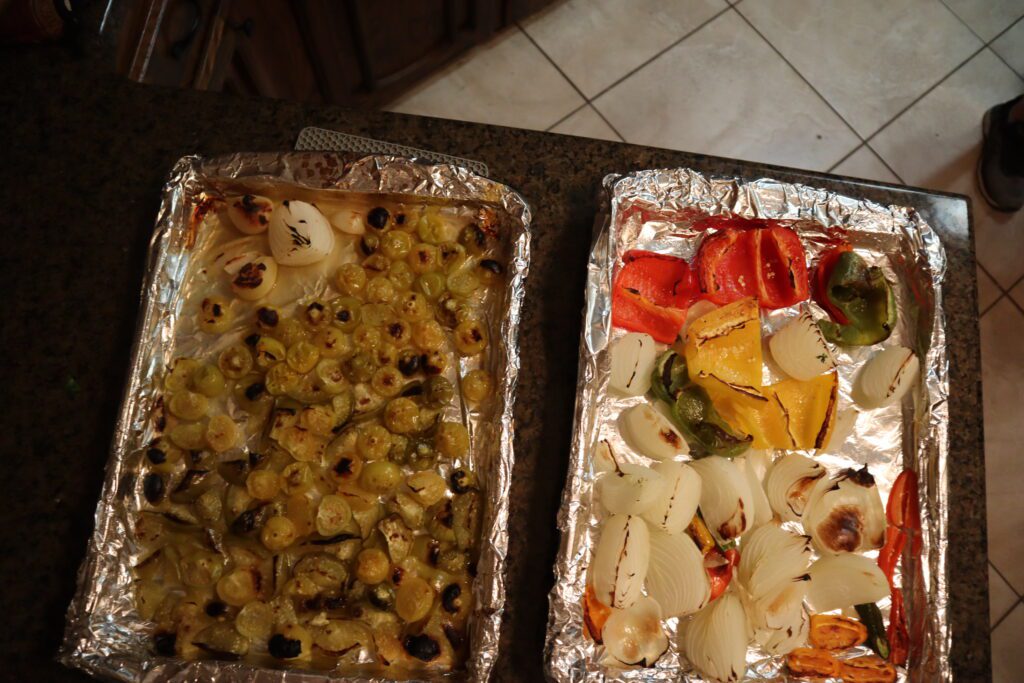 Roasted tomatillos, onions, peppers and garlic 