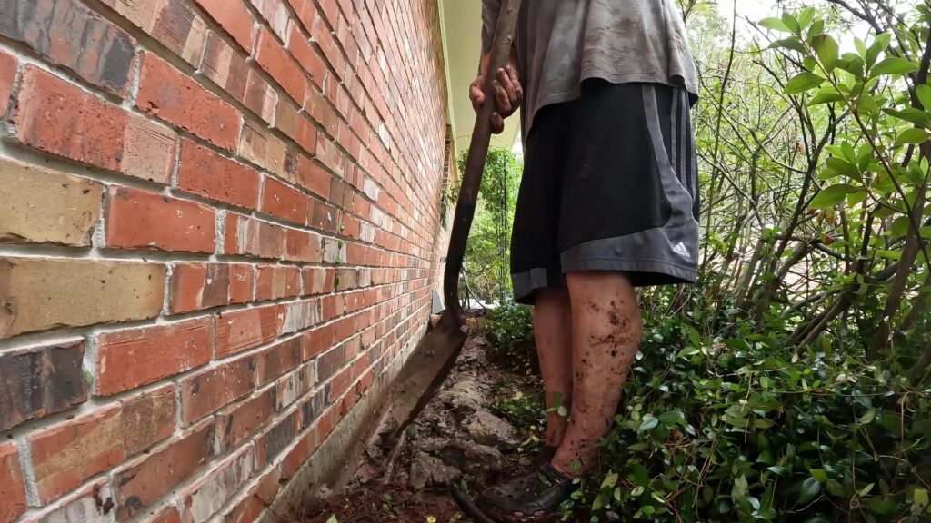 Running Tubing down the Side of the House to Water the Front Beds